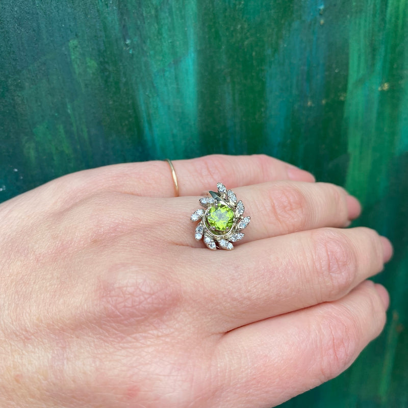 Vivacious Peridot Cocktail Ring with Diamond Swirl