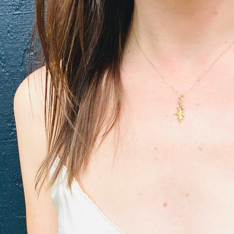 Delicate Gold Oak Leaf Pendant with Pearl Accent