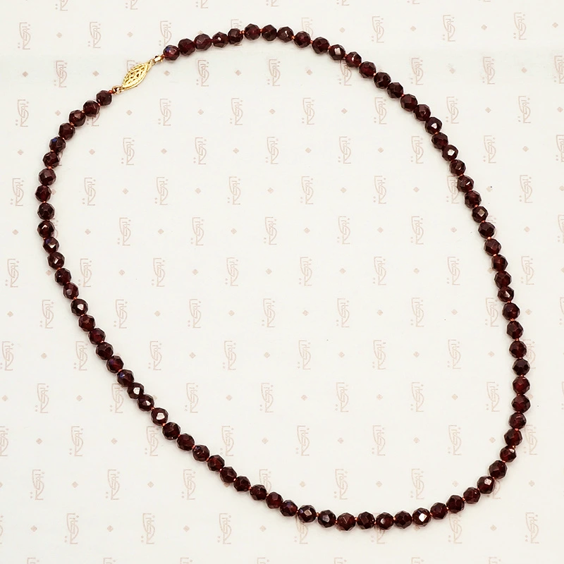 Pretty Strand of Hand Knotted Faceted Garnet Beads
