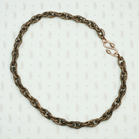 Triple twist copper chain with snake clasp.