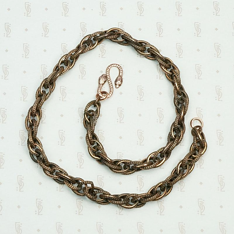 Triple twist copper chain with snake clasp.