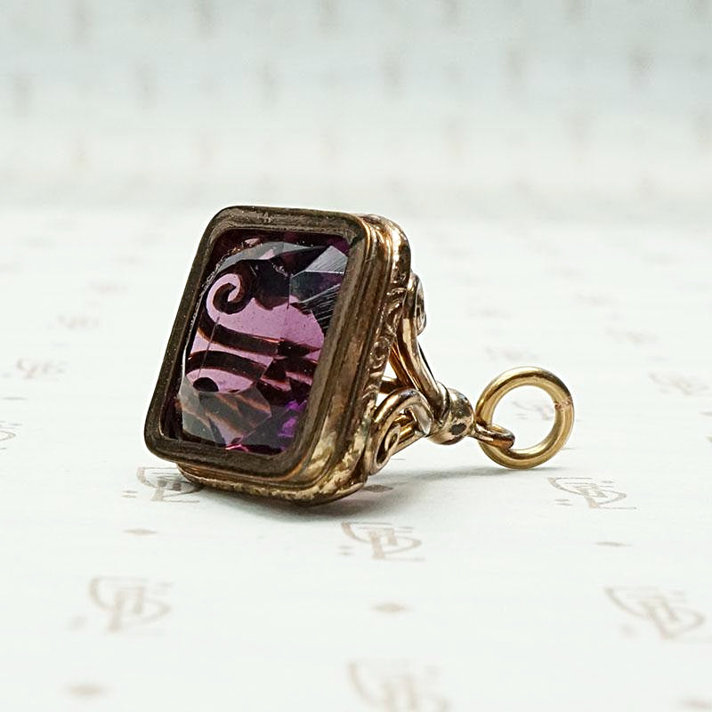 Fancy Amethyst-Colored Glass Fob