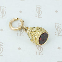 Petite Foliate Fob with Garnet