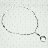 Subtly Graphic Silver and Niello Enamel Chain & Locket