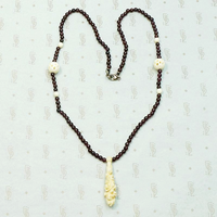 Carved Bone with Garnets Bead Necklace
