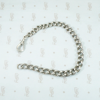 Slinky English Silver Graduated Curb Bracelet