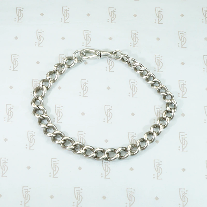 Slinky English Silver Graduated Curb Bracelet
