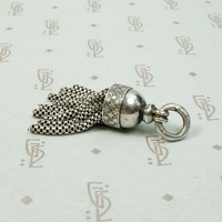 Chubby Silver Tassel with Graphic Star Design