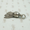 Chubby Silver Tassel with Graphic Star Design