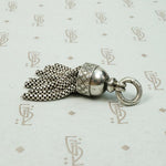 Chubby Silver Tassel with Graphic Star Design
