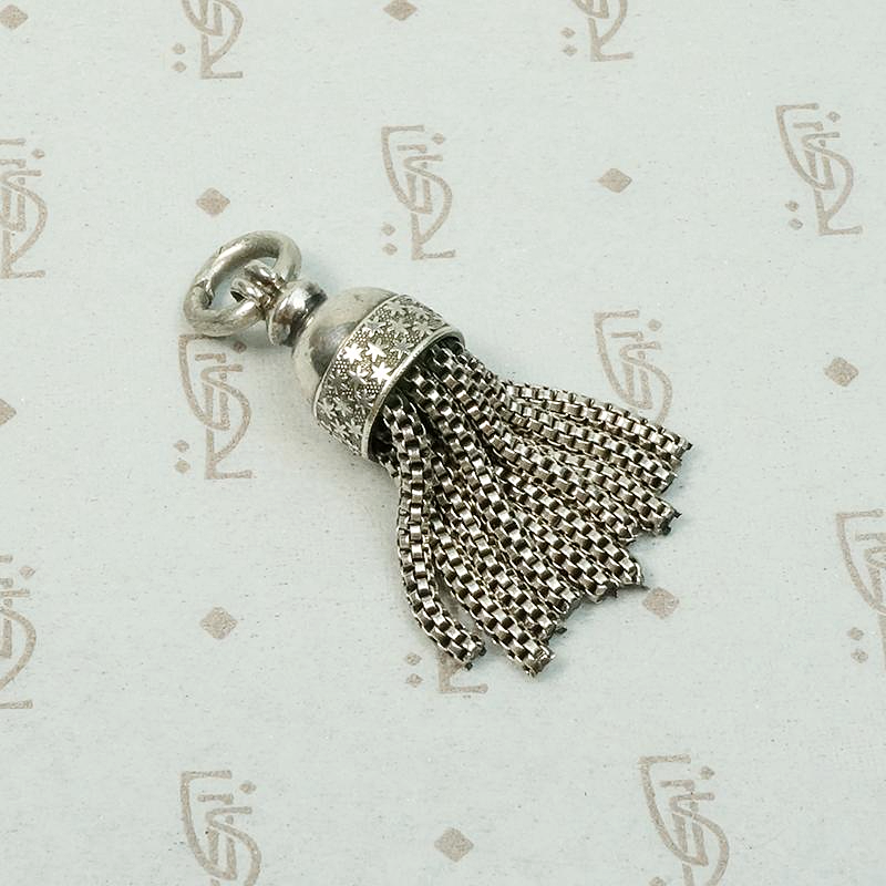 Chubby Silver Tassel with Graphic Star Design