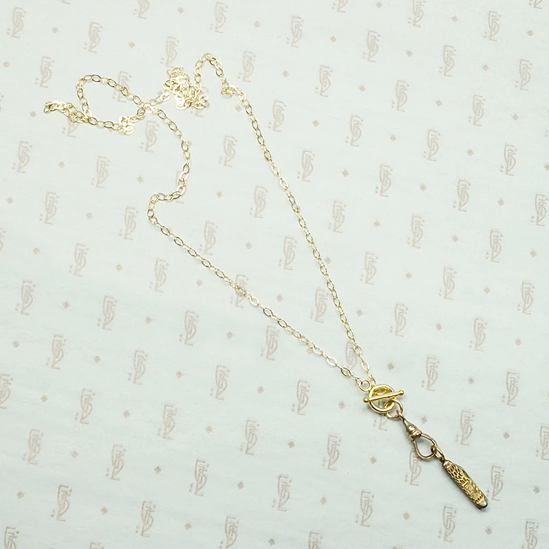 Tiny Brass "Intercast" Pocket Knife Necklace