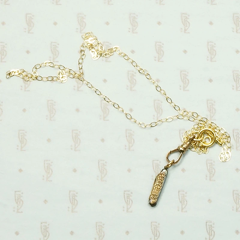 Tiny Brass "Intercast" Pocket Knife Necklace