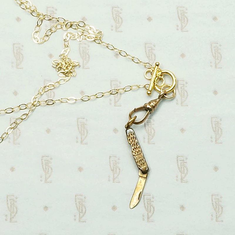 Tiny Brass "Intercast" Pocket Knife Necklace