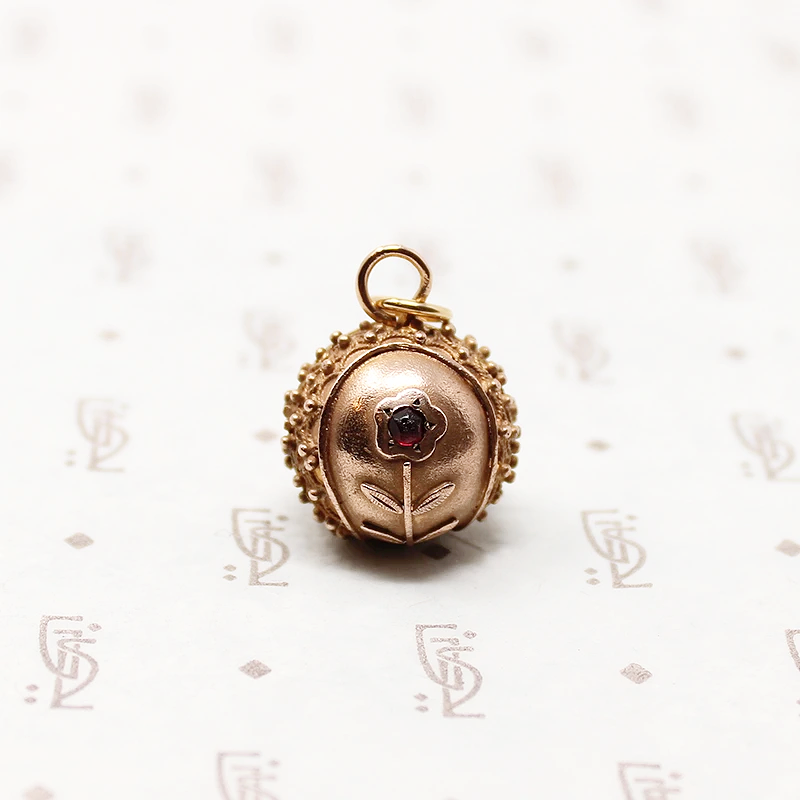 Filigreed Etruscan Revival Ball Fob with Garnets