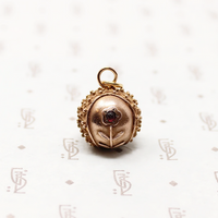 Filigreed Etruscan Revival Ball Fob with Garnets