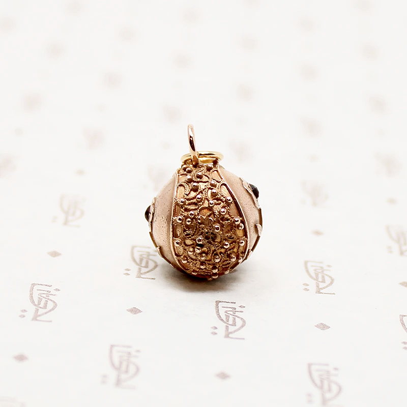Filigreed Etruscan Revival Ball Fob with Garnets