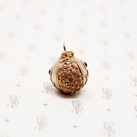 Filigreed Etruscan Revival Ball Fob with Garnets