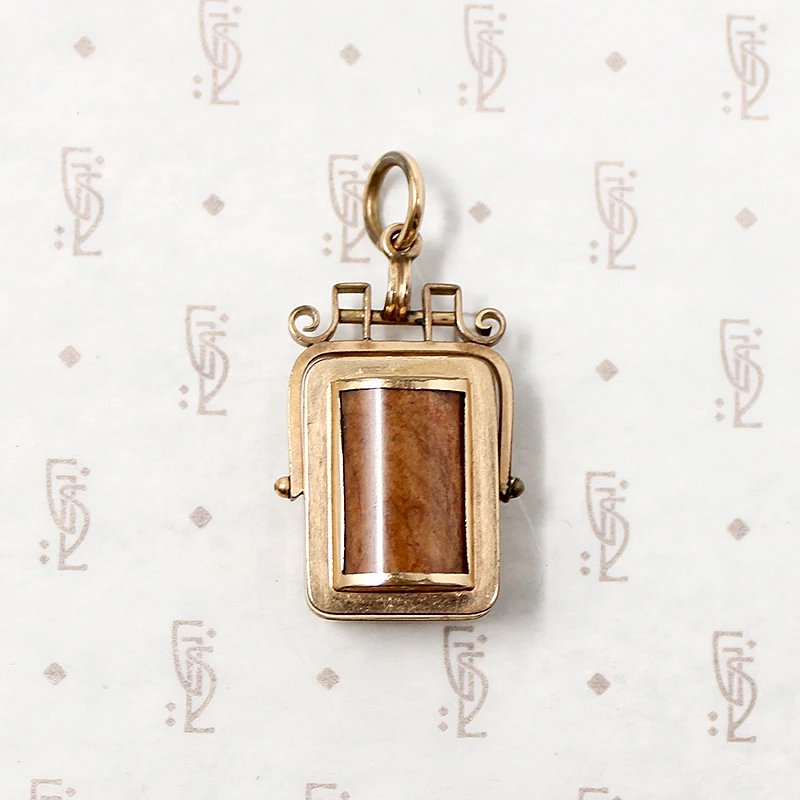 It spins in an ornate gold filled frame, perfect for fidgeting with. This Victorian Swivel Locket Fob Has It All