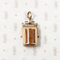 It spins in an ornate gold filled frame, perfect for fidgeting with. This Victorian Swivel Locket Fob Has It All