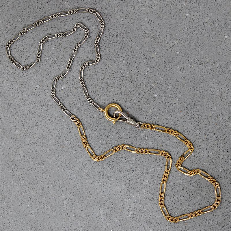 Striking Two-Tone Figaro Married Chain from AI