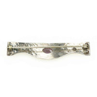 Arts & Crafts Sterling Brooch set with an Amethyst