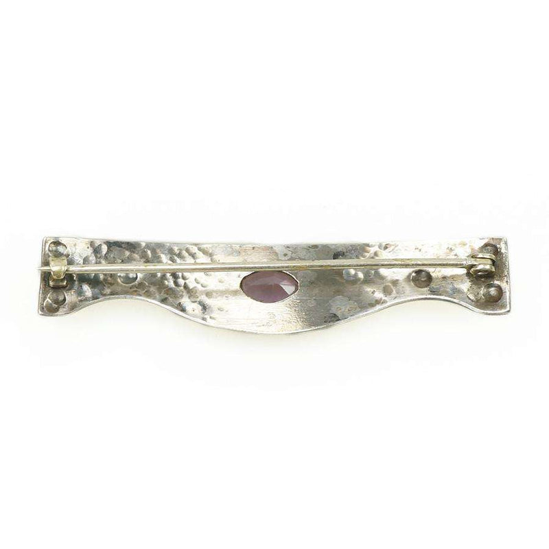 Arts & Crafts Sterling Brooch set with an Amethyst