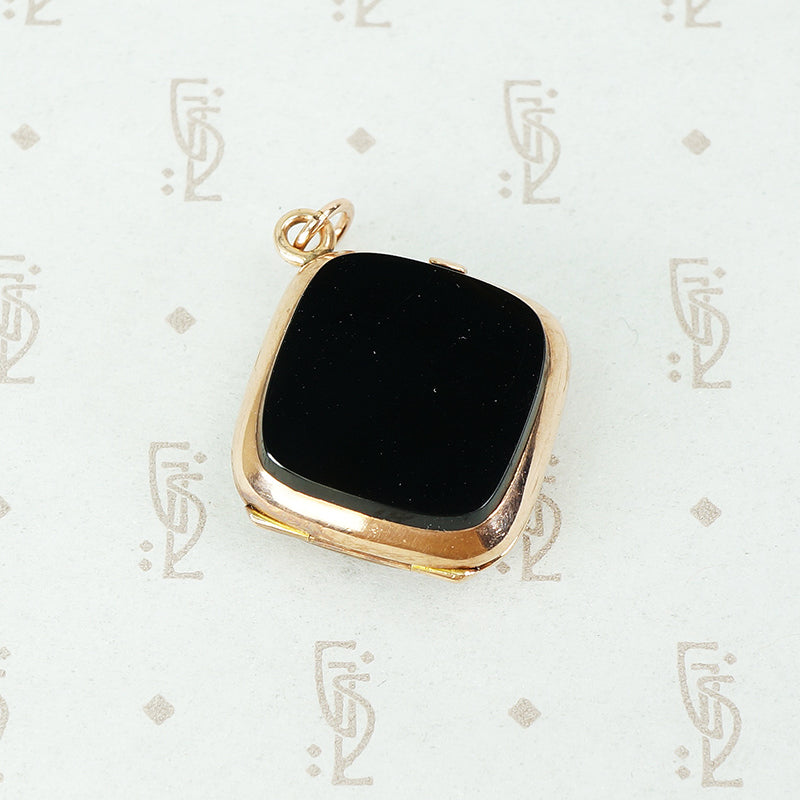 double sided agate locket in 14k rose gold onyx side