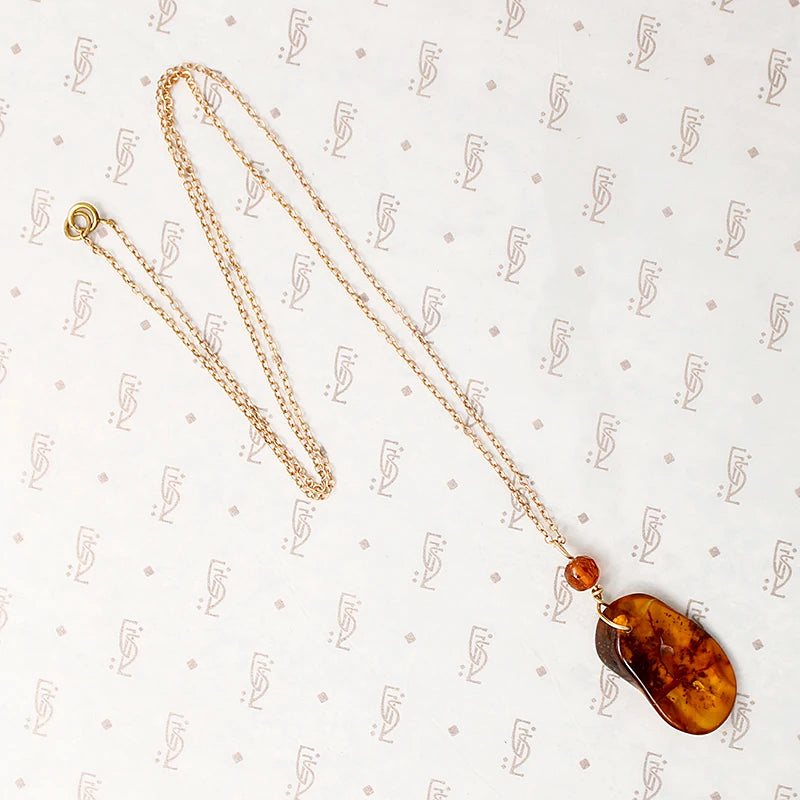 Amber Necklace with Faceted Amber Bead by Ancient Influences