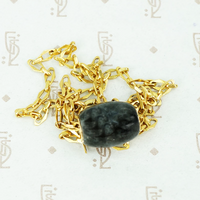 black jade bead on 14k vintage chain necklace close up