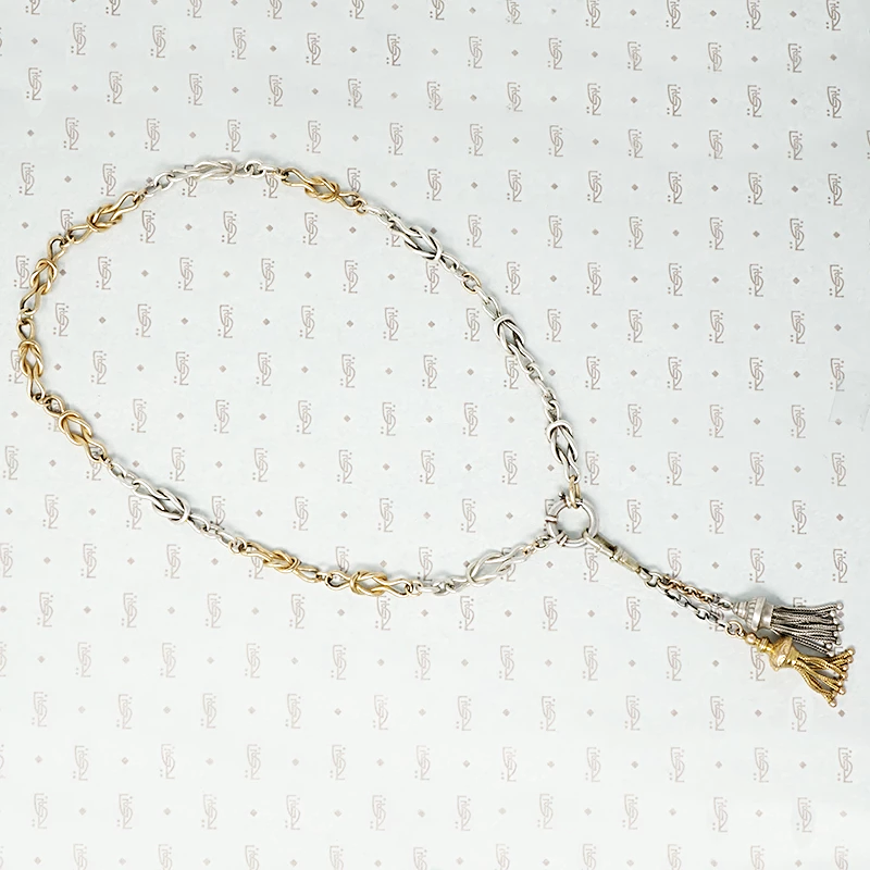 silver and gold filled lovers knot chain with extra big ring