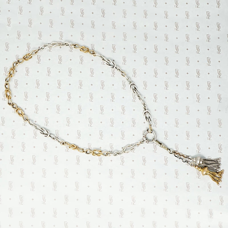 silver and gold filled lovers knot chain with extra big ring