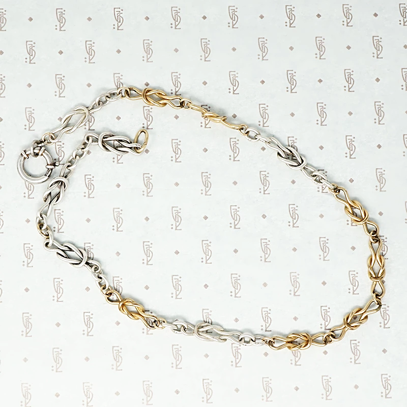 silver and gold filled lovers knot chain with extra big ring