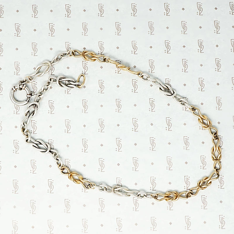 silver and gold filled lovers knot chain with extra big ring