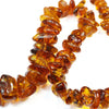 Long Necklace of Graduated Honey Colored Amber