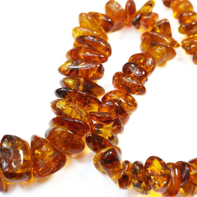 Long Necklace of Graduated Honey Colored Amber
