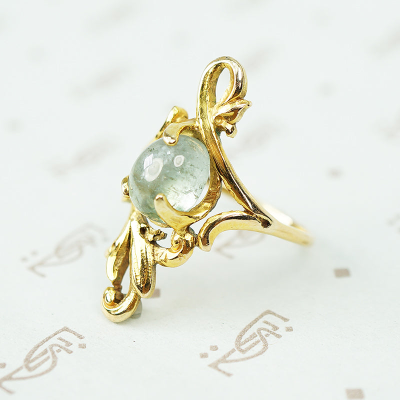 bluish green cabochon tourmaline in 14k yellow gold art nouveau circa 1890-1900 ring