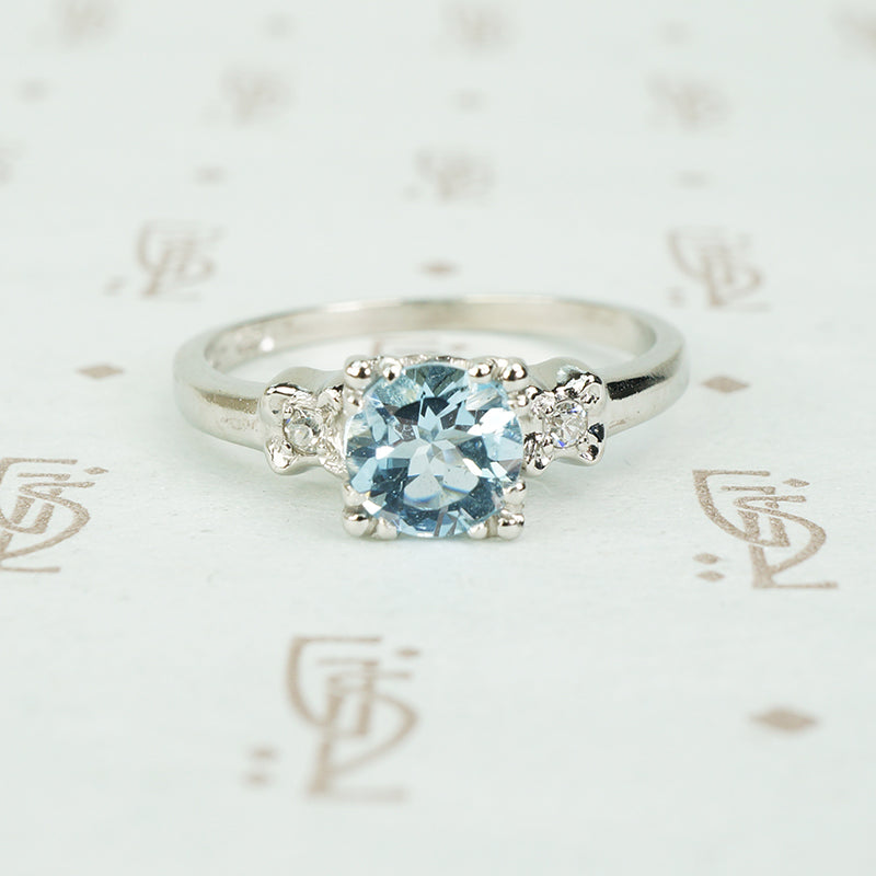 platinum and round .67 carat aquamarine platinum engagement ring