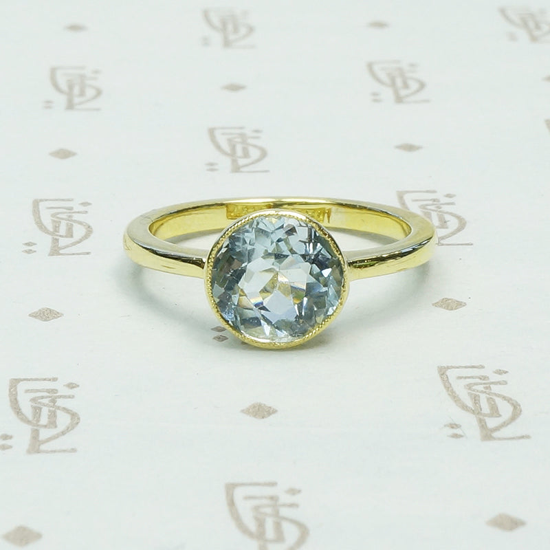 Simply Beautiful Bezel set Aquamarine in 18k