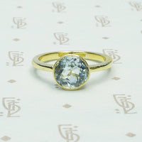 Simply Beautiful Bezel set Aquamarine in 18k