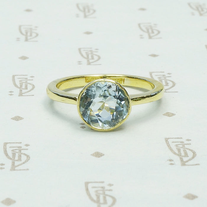 Simply Beautiful Bezel set Aquamarine in 18k