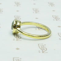 Simply Beautiful Bezel set Aquamarine in 18k