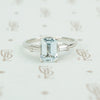 emerald cut aquamarine with baguette diamond sides in platinum