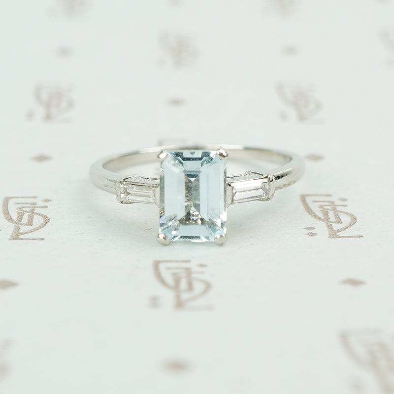 emerald cut aquamarine with baguette diamond sides in platinum