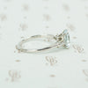 emerald cut aquamarine with baguette diamond sides in platinum side view