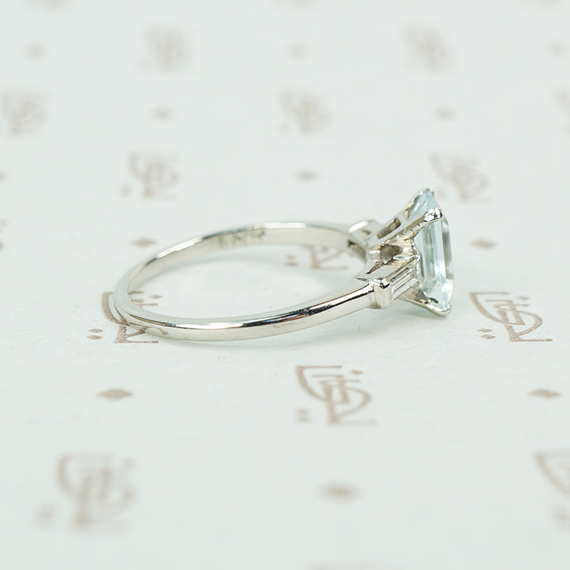 emerald cut aquamarine with baguette diamond sides in platinum side view