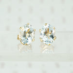 oval aquamarines in 14k gold studs