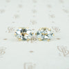 Oval Aquamarine Studs in Yellow Gold