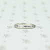 channel set diamond white gold band with arrow design