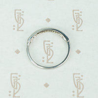channel set diamond white gold band with arrow design side view